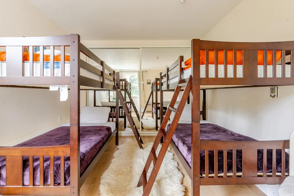 Bedroom with queen bed and mountain view