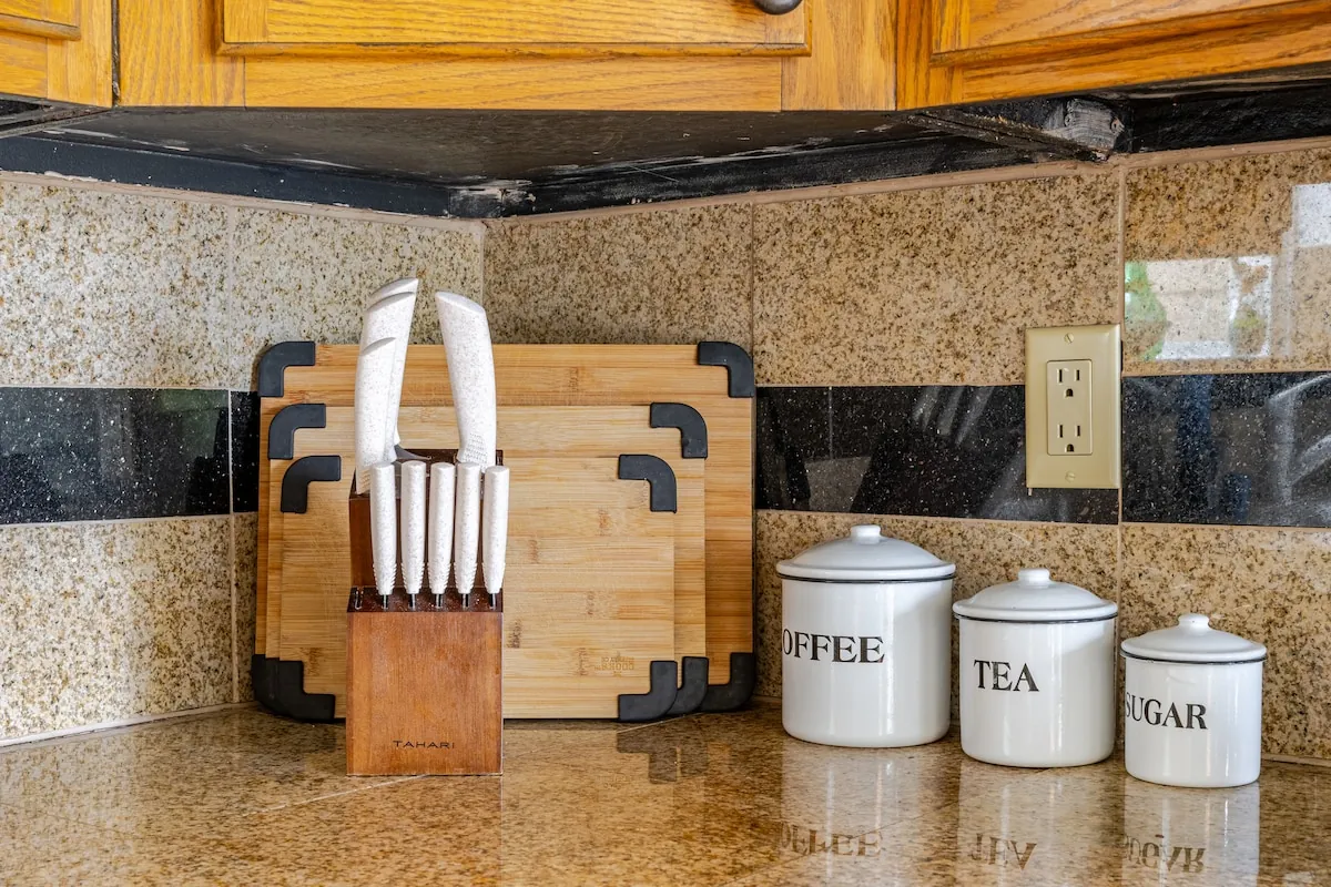 Kitchen counter with coffee, tea, and sugar station